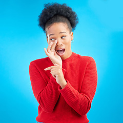 Image showing Secret, gossip and black woman in studio pointing isolated on a blue background. Happy, whisper and African person with deal, promotion or news for offer, privacy and announcement of info on mockup