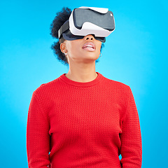 Image showing VR, metaverse and digital glasses with woman watching a video with augmented reality. Studio, female person and blue background with future technology and online web user with 3d virtual network