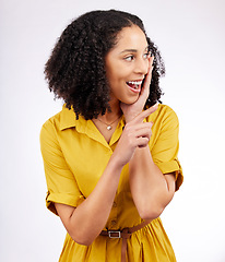 Image showing Wow, pointing and excited woman in studio with a surprise or advertising isolated on a white background. Promotion, sale and young african female person with hand sign for discount announcement