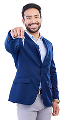 Image showing keys, studio portrait and happy man, realtor or person smile for new home investment, property payment or sales. Apartment, house and Asian real estate agent giving ownership on white background