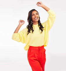 Image showing Indian woman, dance and happy with fashion in studio with white background for beauty, cosmetics or happiness on face. Celebration, smile and excited person with fun energy or style of trendy clothes