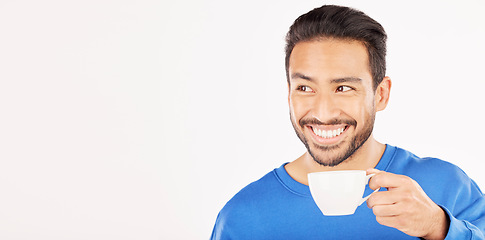 Image showing Happy asian man, coffee and thinking on mockup space for morning drink against a white studio background. Male person smile in dream, idea or wonder with tea cup or hot beverage for breakfast start