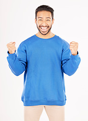 Image showing Winner, portrait and man with yes and excited gesture in a studio with a smile. Motivation, happy and male person with achievement and win reaction from target and goal victory with white background