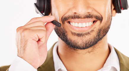 Image showing Call center, man and mouth in studio with microphone for customer service, advisory or contact on white background. Closeup face of CRM salesman, IT support and telecom of FAQ telemarketing questions