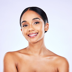 Image showing Portrait, beauty and skincare with a model woman in studio on a gray background for natural wellness. Face, smile and aesthetic with a happy young person posing for luxury cosmetics or dermatology