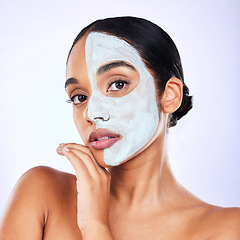 Image showing Face mask, portrait and woman in studio with skincare, result or dermatology wellness on grey background. Facial, comparison and female with half beauty, routine and clay product for skin exfoliation