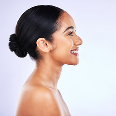 Image showing Skincare, profile and happy Indian woman in studio for body care, cosmetics and results on white background. Side, beauty and female wellness model smile for luxury dermatology, treatment or routine