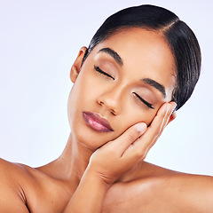 Image showing Beauty, skincare and cosmetics with face of woman in studio for makeup, glow and self care. Spa treatment, natural and dermatology with female model on white background for wellness and facial