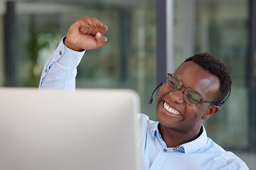 Image showing Winner, computer and call center with a black man cheering as a consultant in his customer service office. Success, sale and motivation with a happy young male support agent in a crm workplace