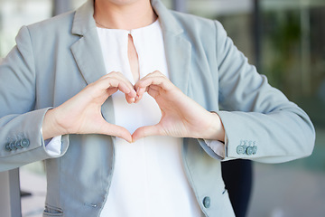 Image showing Hands, heart and business woman with love emoji for care, kindness and like review in office. Closeup of female worker with finger shape for thank you, trust and sign of hope, support icon and peace
