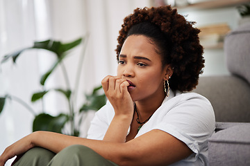 Image showing Depressed, sad and african girl in home with anxiety for future with upset expression. Worry concern and remembering with female person in living on floor with problems or mental health with memory.