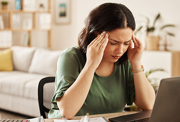 Image showing Woman, burnout and headache with laptop and remote work stress at a desk feeling frustrated. House, female person and confused from computer problem with learning anxiety from online website project