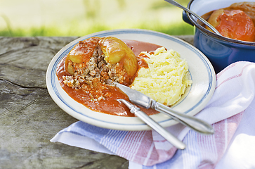 Image showing Stuffed peppers in tomato sauce