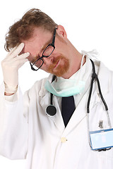 Image showing doctor having headache 