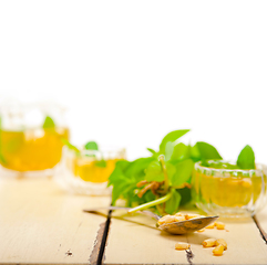 Image showing Arab traditional mint and pine nuts tea