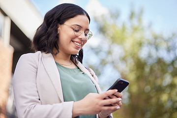 Image showing Outdoor, business woman and reading a cellphone for work or communication on website for networking. Typing, technology and app with professional female in city for information or social media.