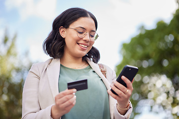 Image showing Phone, credit card and woman in city for online shopping, easy business payment and fintech or e commerce in park. Mobile, debit and professional person for web 3.0 finance, outdoor travel or banking