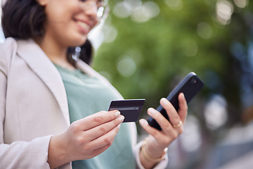 Image showing City, credit card and woman hands for phone online shopping, easy payment and fintech or e commerce in park. Mobile, debit and business person with finance management, outdoor travel and banking