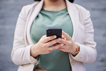 Image showing Phone, outdoor and woman hands for business communication, networking and social media. Professional chat, mobile search and person or worker reading information or opportunity on wall background