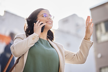 Image showing Business, woman and wave for taxi and phone call, talking in the city and outdoor travel to office building on public transport. Happy, waving and person speaking on mobile and calling for a cab