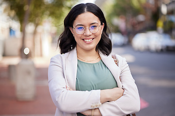 Image showing Happy, arms crossed and portrait of woman in city for corporate confidence, work and career. Smile, expert and a professional young female employee in the street or road for travel to the workplace