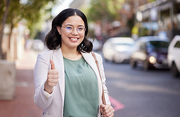 Image showing Business woman, thumbs up and portrait in the city, street or professional worker with success, agreement or thank you. Hand, sign and happy worker in urban, town or walking to office building