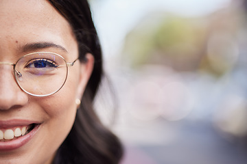 Image showing Woman face, outdoor portrait and space for mock up with smile, blurred background and bokeh in street. Business person, happy and closeup with glasses, vision and healthy eyes in city, metro or road