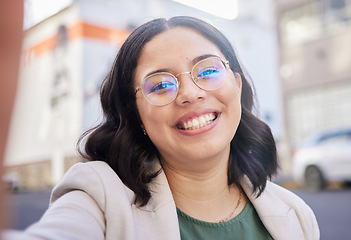 Image showing Young business woman, selfie and city with smile, glasses and excited for start to finance career in street. Employee, outdoor and happy with memory, photography and profile picture for social media