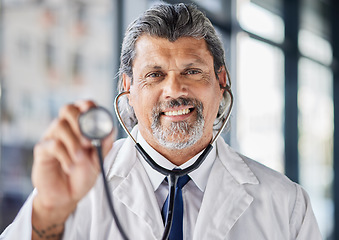 Image showing Doctor, portrait and happy man with stethoscope in cardiology, healthcare service and support or check. Heart, patient POV and medical professional or mature person in clinic services or consultation