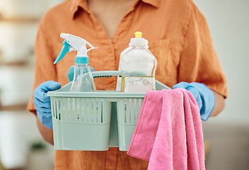 Image showing Hands of person with detergent basket for cleaning, housekeeping and disinfection of dirt, bacteria and dust. Closeup of cleaner, maid and container of chemical bottles, products and liquid tools