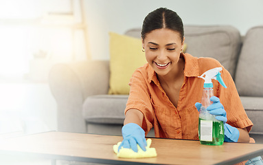 Image showing Spray, woman and smile for cleaning table, furniture and housekeeping services at home. Female cleaner wipe surface with cloth, bottle of chemical product and disinfection of dust, bacteria and dirt