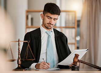 Image showing Attorney man, scales and hammer with writing, documents and notes for reading, thinking and crime analysis. Advocate, lawyer or judge with legal research, paperwork and analytics for court evidence