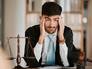 Image showing Judge man, stress headache and office for thinking, solution or problem solving with worry for case. Advocate, lawyer or attorney with legal hammer, paperwork or idea with fatigue for court evidence