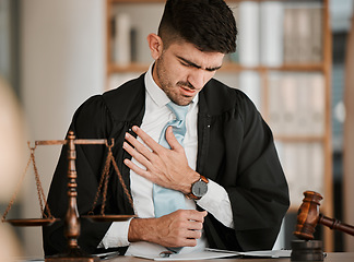 Image showing Lawyer man, chest pain and office with stress, tired or burnout for cardiovascular problem at desk. Judge, attorney or advocate with heart attack, emergency or injury for lungs, breathing or accident