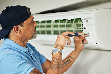 Image showing Electrician, maintenance and air conditioning with man and screwdriver for ac repair, ventilation and power. Engineering, electricity and inspection with technician and tools for fan and contractor