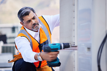 Image showing Drill, air conditioner electrician and man at building for renovation, maintenance and service. Mature contractor, construction tools and engineering upgrade of mechanic system, power or hvac in city