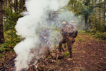 Image showing Soldiers squad was capture alive terrorist and interrogation them on them on special tactics violent way