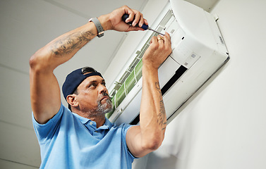 Image showing Maintenance, ac repair and air conditioner with man and screwdriver for electrician, ventilation and power. Engineering, electricity and inspection with technician and tools for fan and contractor