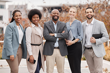 Image showing Team, portrait and business people with arms crossed in the city for corporate teamwork and diversity. Smile, together and a group of employees with pride, trust and professional solidarity for work