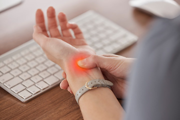 Image showing Business person, wrist pain and red injury from osteoporosis, orthopedic joint and laptop typing in office. Closeup, hands and worker with carpal tunnel, fibromyalgia and muscle fatigue at computer