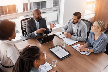 Image showing Business meeting, manager and people planning, management and speaking of financial report or proposal. Diversity women, men and corporate leader on laptop and documents for team or employee feedback