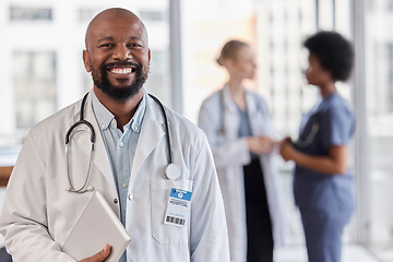 Image showing Smile, portrait and hospital doctor, black man or cardiologist team leader of healthcare trust, medical wellness and cardiology. Group leadership, tablet and African person for professional support