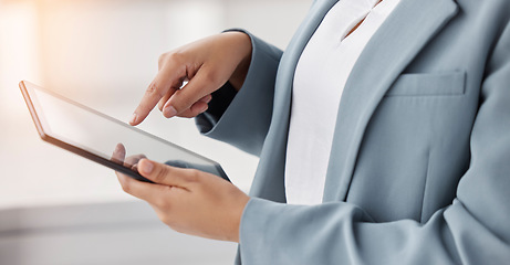 Image showing Hands, typing and a person with a tablet at work for communication, email or internet research. Closeup, business and an employee with technology for analysis, website or working online in an office