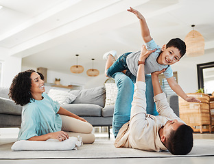 Image showing Portrait, mother or child playing with father on floor relaxing as a happy family bonding in Portugal with love. Care, flying airplane game or parents smile with a kid enjoying fun time on a holiday