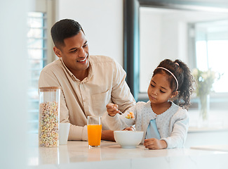 Image showing Happy, morning and a child with father for breakfast, food in a kitchen and care for nutrition at home. Smile, together and a young dad with a girl kid eating cereal in a house for health and hungry