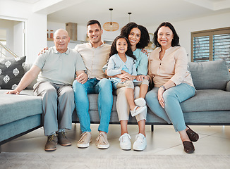 Image showing Relax, portrait and generations of family on sofa together, support and love in new home or apartment. Men, women and child on couch, happy smile with grandparents, parents and kid in living room.