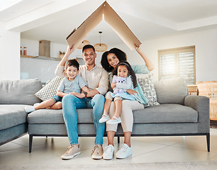 Image showing Family, children and house portrait and insurance, investment on financial safety on sofa with mother and father. Parents, kids and interracial people with cardboard roof for home cover and security