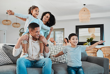 Image showing Play, mother or children with father in living room to relax as a happy family bonding in Portugal with love. Home sofa, flying airplane game or parents smile with kids enjoying fun time on a holiday