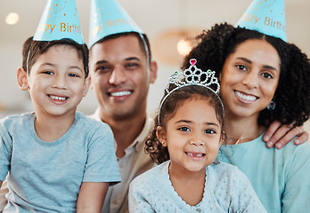 Image showing Family home, parents and kids in portrait for birthday, party and happy together for celebration. Mother, father and young children with smile, hat and excited with care, love and event in house