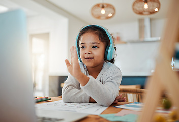 Image showing Video call, laptop and child for e learning, online class and home education, translation and listening on headphones. Happy kid or girl waves hello on computer, teaching platform and virtual school